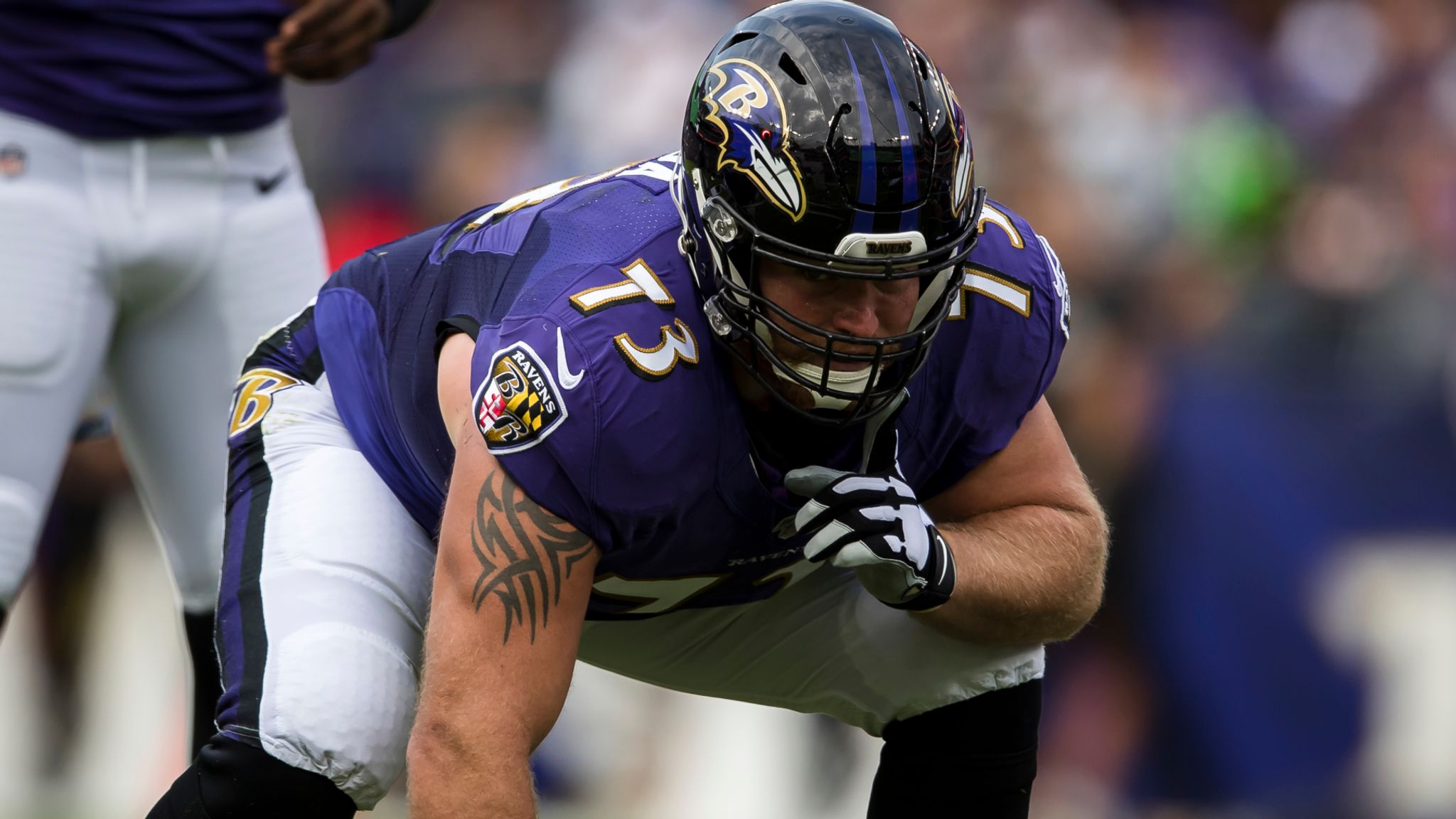 Baltimore Ravens' Marshal Yanda spits at Bengals' Vontaze Burfict