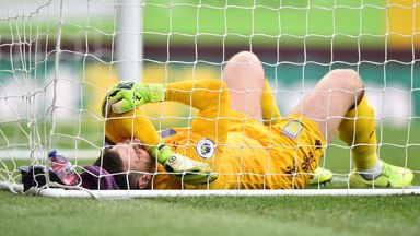 Image of Tom Heaton lies on the turf after picking up an injury in the second half