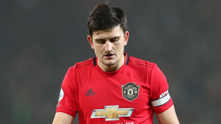 Harry Maguire walks off after the 2-0 loss to Burnley