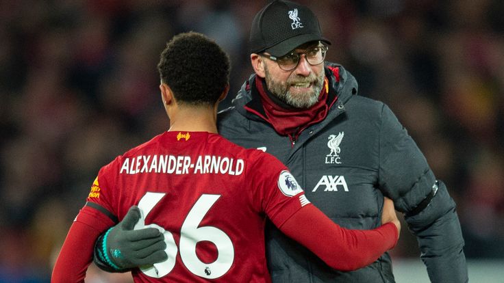 Liverpool manager Jurgen Klopp embraces Trent Alexander-Arnold 