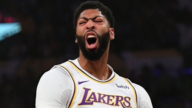 Anthony Davis celebrates after making a big play against the Phoenix Suns