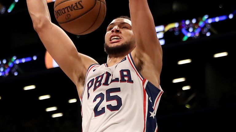 Ben Simmons scores with a dunk en route to a triple-double against Brooklyn