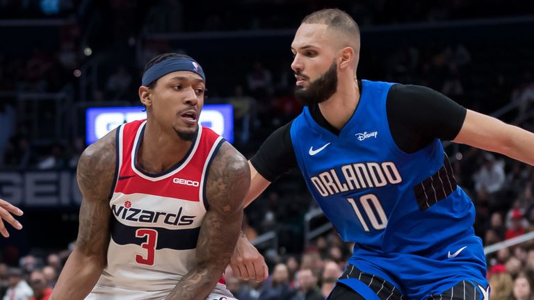 Bradley Beal is guarded by Evan Fournier