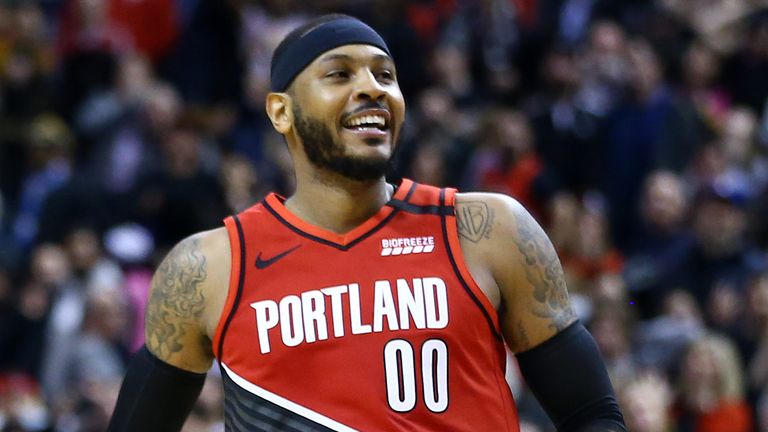 Carmelo Anthony celebrates his game-winning basket against the Toronto Raptors