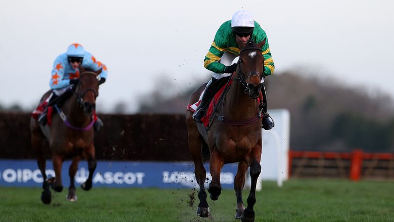 Defi Du Seuil, ridden by Barry Geraghty, on his way to victory at Ascot Racecourse.