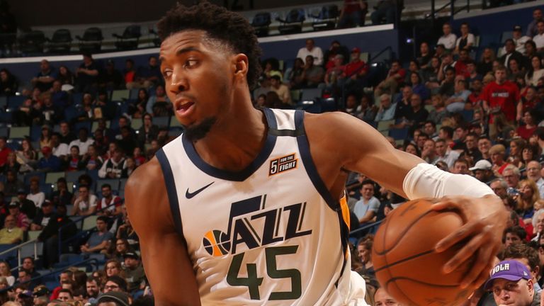 Donovan Mitchell looks to beat his defender off the dribble