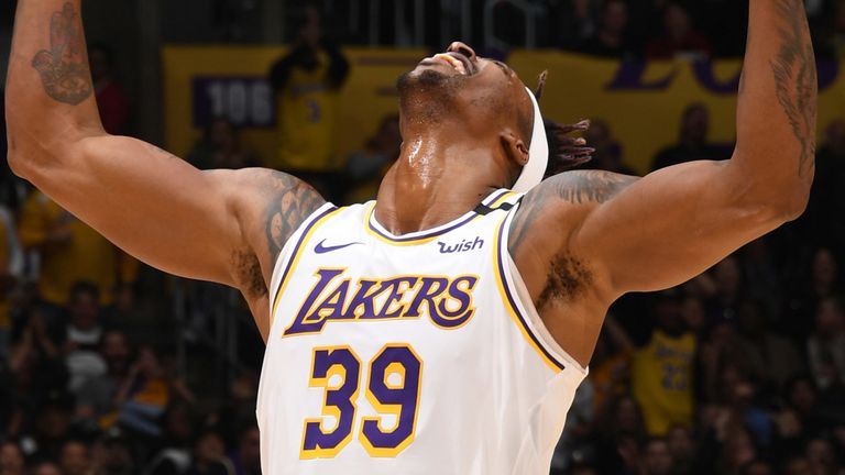 Dwight Howard celebrates a defensive play during the Lakers' win over the Pistons