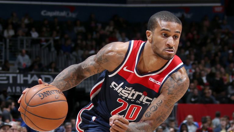 Gary Payton II drives at the Miami Heat defense