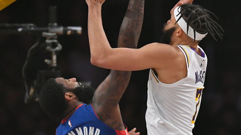 Javale McGee challenges Andre Drummond at the rim