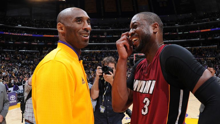 Kobe Bryant and Dwyane Wade share a word before a Lakers-Heat game