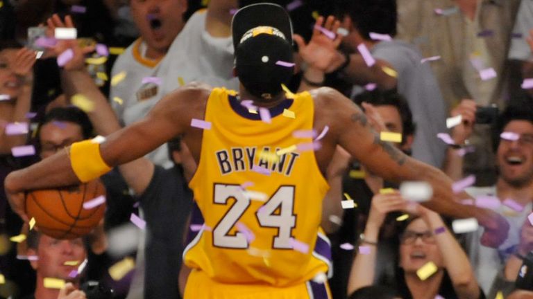 Kobe Bryant celebrates after winning the NBA championship with the Los Angeles Lakers