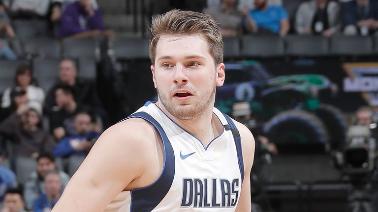 Luka Doncic controls possession against the Kings