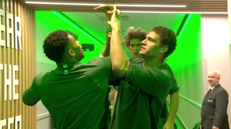 Giannis Antetokounmpo is denied by the Lopez brothers in the Milwaukee Bucks&#39; pre-game wrestling ritual