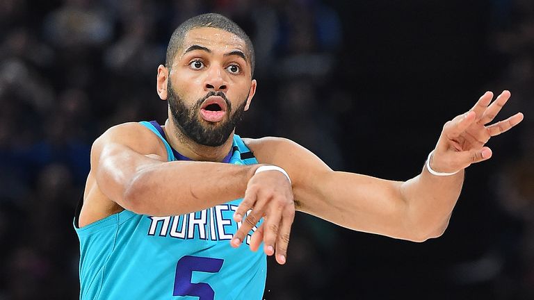 Nicolas Batum makes a pass during Charlotte's loss to Milwaukee in Paris