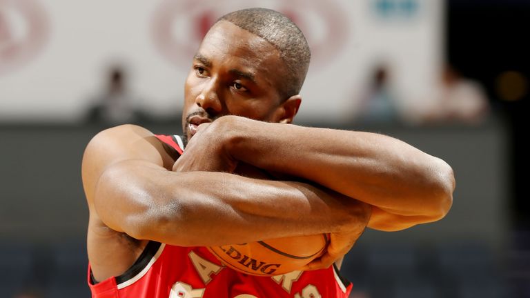 Serge Ibaka protects the ball in the Raptors' overtime win over the Hornets