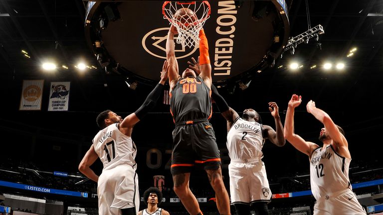 Aaron Gordon of the Orlando Magic dunks the ball against the Brooklyn Nets