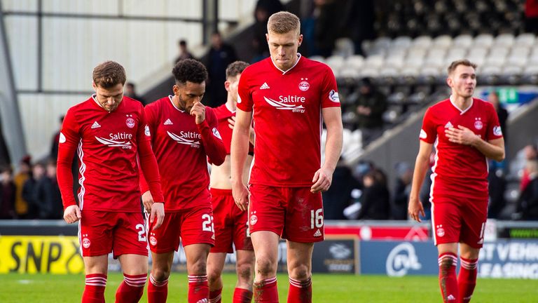 Aberdeen’s Sam Cosgrove walks off dejected at full time during the Premiership match against St Mirren
