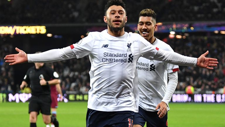 Alex Oxlade-Chamberlain celebrates after putting Liverpool 2-0 up at West Ham