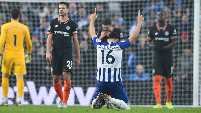 Alireza Jahanbakhsh drops to his knees at full time after his goal secures a point for Brighton at home to Chelsea