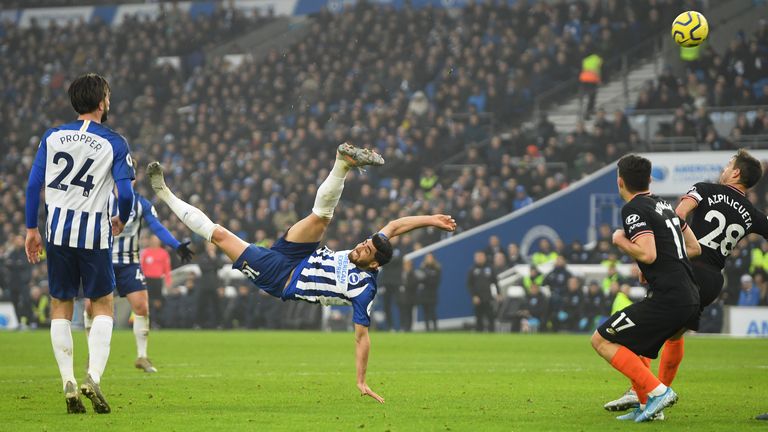 Alireza Jahanbakhsh twists in the air during his acrobatic equaliser for Brighton against Chelsea