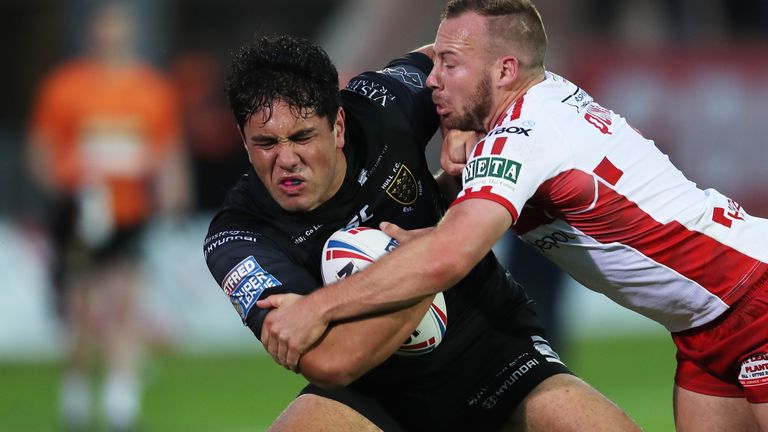 Picture by Ash Allen/SWpix.com - 27/06/2019 - Rugby League - Betfred Super League - Hull KR v Hull FC - KCOM Craven Park, Hull, England - Andre Savelio of Hull FC is tackled by Adam Quinlan of Hull KR.