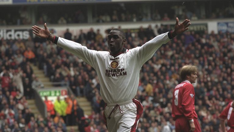 Andy Cole of Manchester United celebrates a goal during the Premier League match against Liverpool at Anfield in Liverpool, England. Manchester United won 3-1.