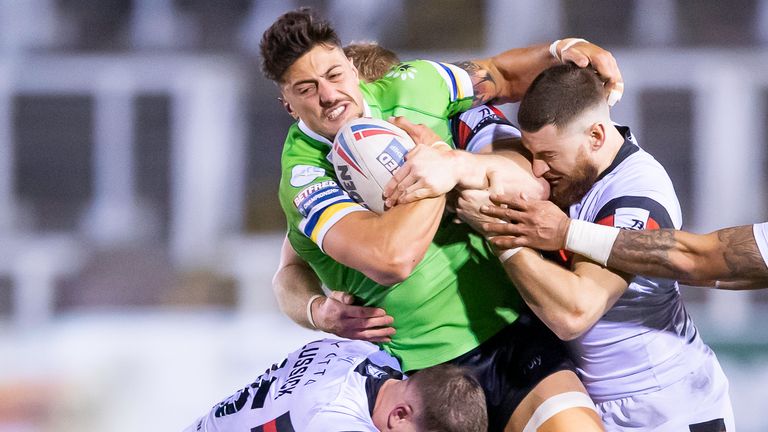 Picture by Allan McKenzie/SWpix.com - 16/02/2019 - Rugby League - Betfred Championship - Toronto Wolfpack v Widnes Vikings - Kingston Park, Newcastle, England - Widnes's Anthony Gelling is tackled by Toronto's Darcy Lussick & Blake Wallace.