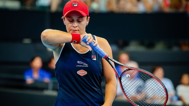 Ashleigh Barty of Australia reacts after a point against Jennifer Brady of the US during their women's singles match at the Brisbane International tennis tournament in Brisbane on January 9, 2020