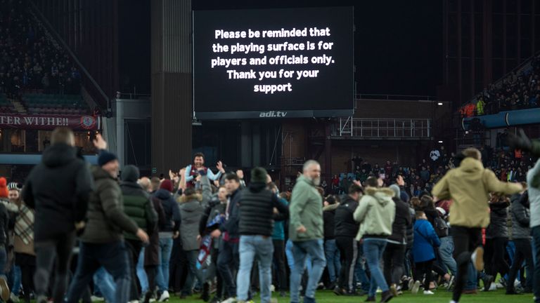 BIRMINGHAM, ENGLAND - JANUARY 28:  Aston Villa fans invade the pitch after the Carabao Cup Semi Final match between Aston Villa and Leicester City at Villa Park on January 28, 2020 in Birmingham, England. (Photo by Visionhaus) 