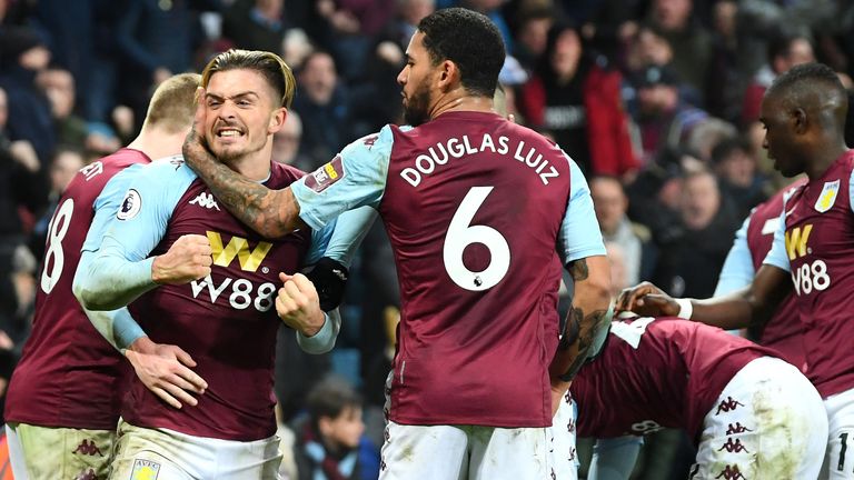 Villa players celebrate their last-gasp win over Watford