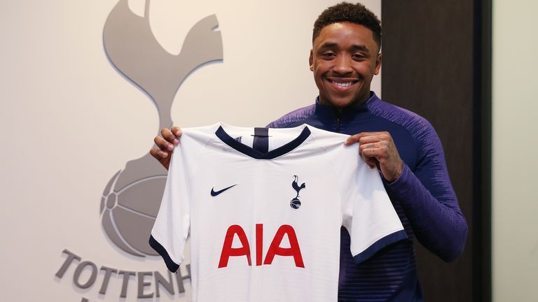 Steven Bergwijn poses with a Tottenham