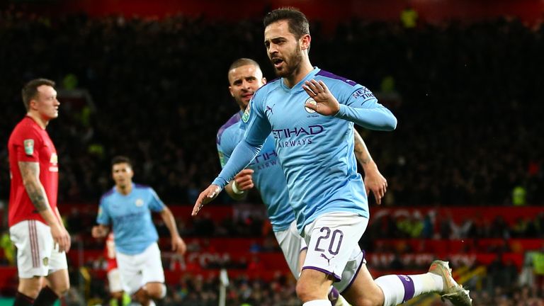 Bernardo Silva of Manchester City celebrates after scoring a goal to make it 0-1 during the Carabao Cup Semi Final match between Manchester United and Manchester City at Old Trafford on January 7, 2020 in Manchester, England