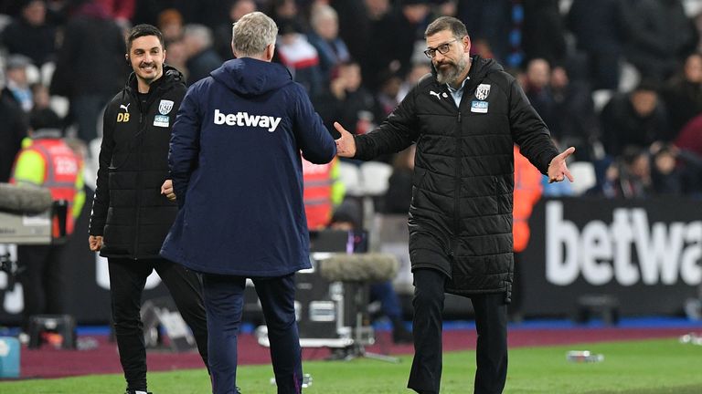 Slaven Bilic (R) gestures to David Moyes at the final whistle