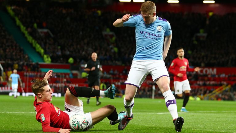Brandon Williams of Manchester United and Kevin De Bruyne of Manchester City 