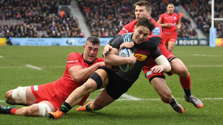 Harlequins' Cadan Murley powers over for a try against Saracens