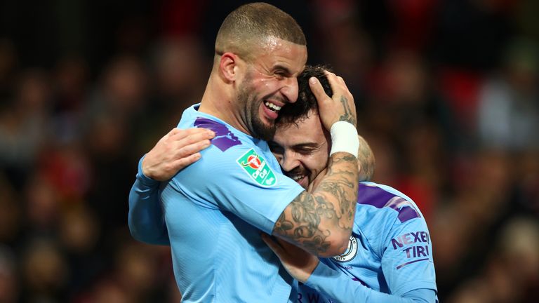 Bernardo Silva celebrates his goal for Manchester City against Manchester United with Kyle Walker