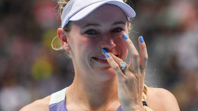 Denmark's Caroline Wozniacki reacts after her defeat against Tunisia's Ons Jabeur their women's singles match on day five of the Australian Open tennis tournament in Melbourne on January 24, 2020