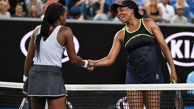 Coco Gauff (L) of the US shakes hands with Venus Williams of the US after their women's singles match on day one of the Australian Open tennis tournament in Melbourne on January 20, 2020. 