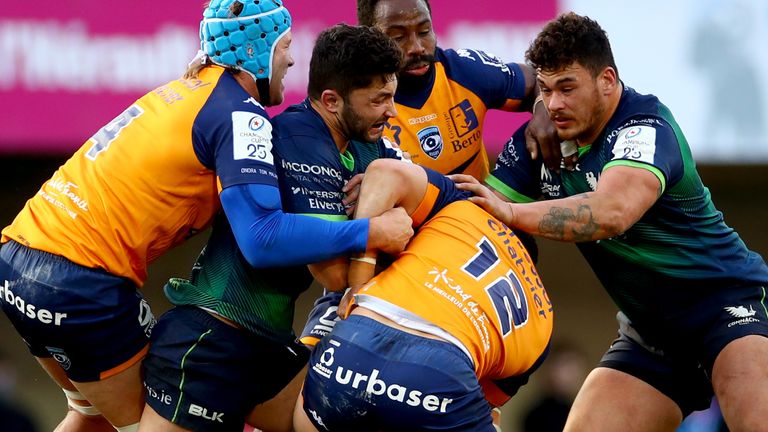 Connacht's Colby Fainga is  tackled by Nico Janse van Rensburg, Fulgence Ouedraogo and Jan Serfontein