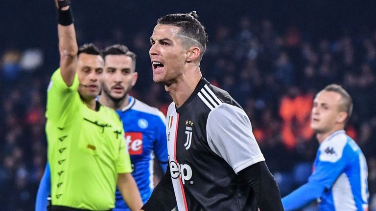 Cristiano Ronaldo is booked and shows his frustration as Napoli beat Juventus