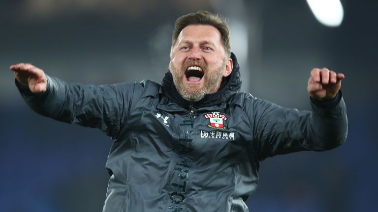 Ralph Hasenhuttl celebrates with the travelling supporters at the final whistle