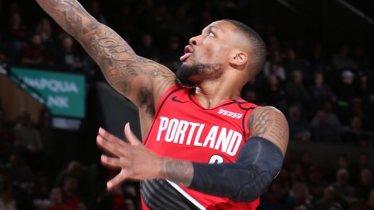 Damian Lillard rises to score against the Houston Rockets