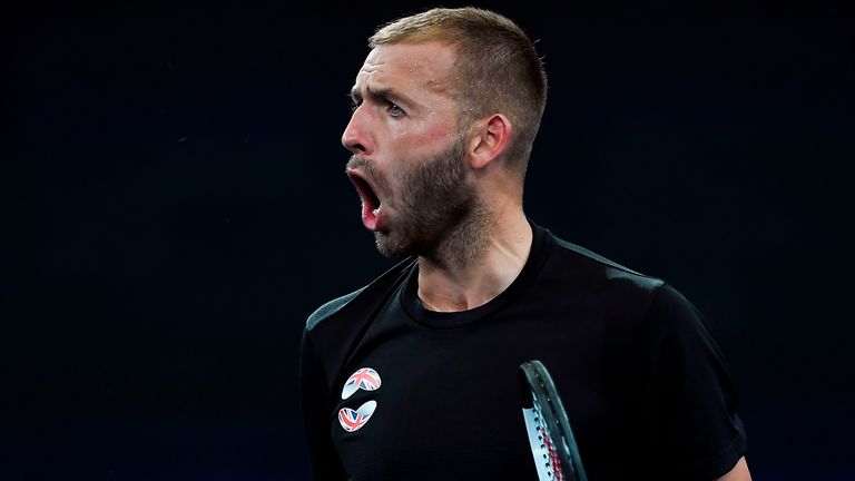 Dan Evans of Britain celebrates victory after his men's singles match against Alex de Minaur of Australia at the ATP Cup tennis tournament in Sydney on January 9, 2020