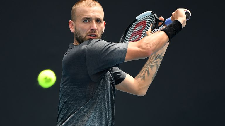 Dan Evans of Great Britain plays a backhand during his Men's Singles first round match against Mackenzie McDonald of the United States of America on day one of the 2020 Australian Open at Melbourne Park on January 20, 2020 in Melbourne, Australia