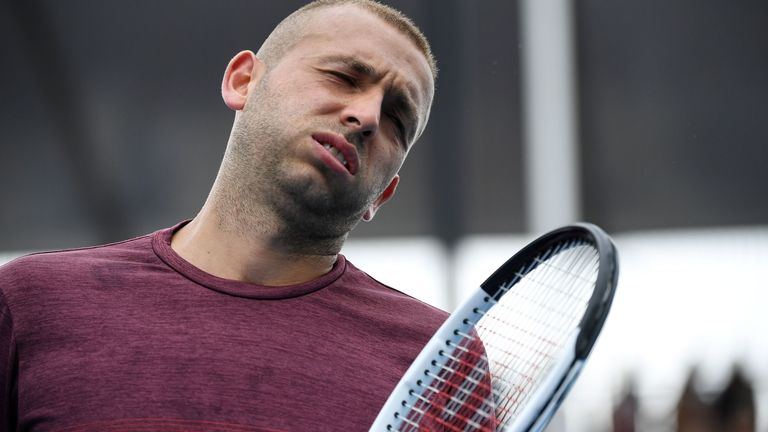 Britain's Dan Evans reacts after a point against Japan's Yoshihito Nishioka during their men's singles match on day three of the Australian Open tennis tournament in Melbourne on January 22, 2020.