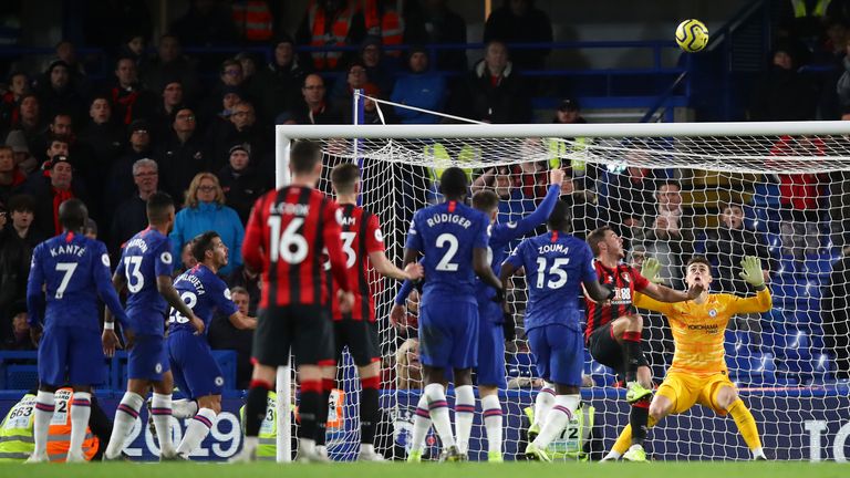Bournemouth's Dan Gosling hooks the ball over the head of Chelsea goalkeeper Kepa Arrizabalaga