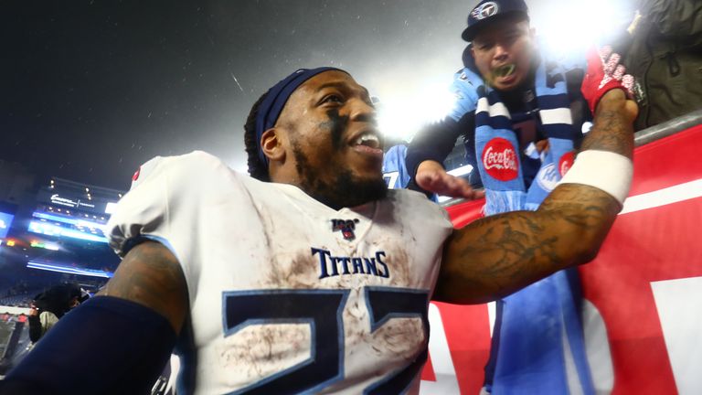 Derrick Henry celebrates  after the Titans beat the Patriots in Foxborough