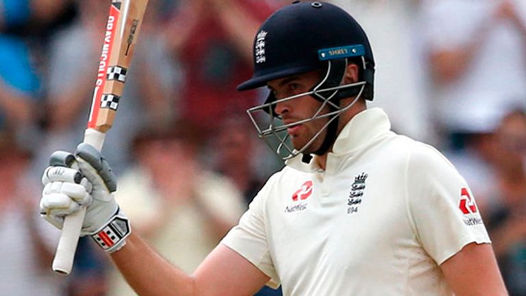 England's Dom Sibley celebrates after scoring a half-century (50 runs) during the third day of the second Test cricket match between South Africa and England at the Newlands stadium in Cape Town on January 5, 2020.