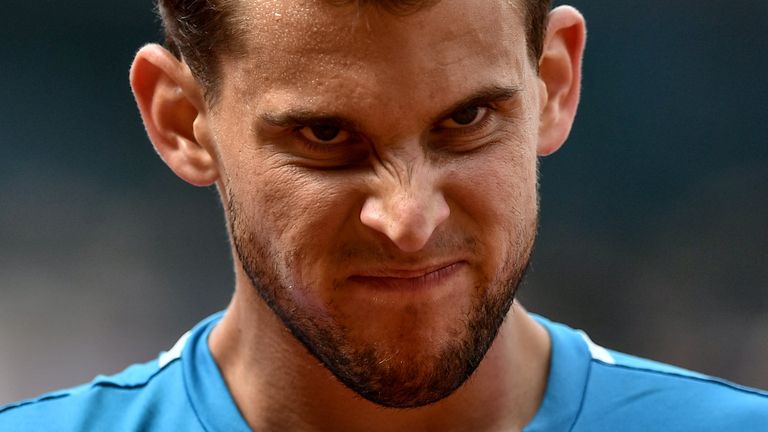 Austria's Dominic Thiem reacts as he plays against Spain's Rafael Nadal during their men's singles final match, on day fifteen of The Roland Garros 2019 French Open tennis tournament in Paris on June 9, 2019.
