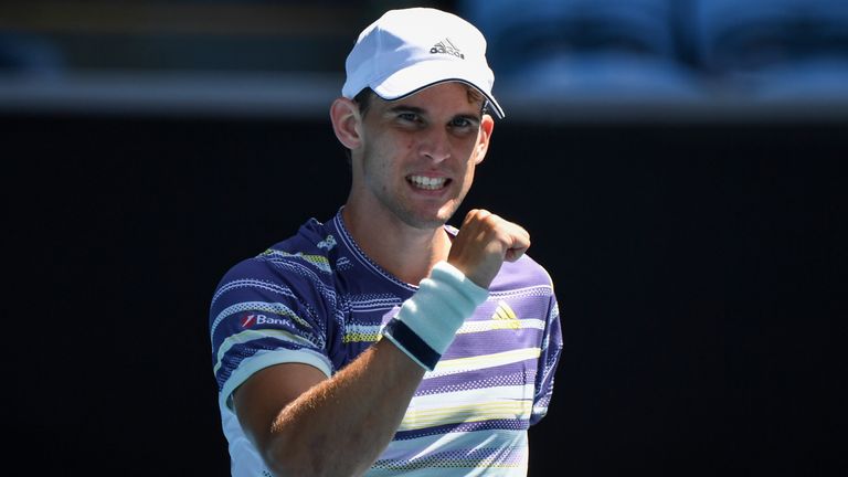 Austria's Dominic Thiem celebrates after victory against France's Adrian Mannarino during their men's singles match on day two of the Australian Open tennis tournament in Melbourne on January 21, 2020.